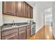 Kitchenette with modern cabinets and granite countertops at 3676 Brookhaven Manor Ne Xing, Atlanta, GA 30319