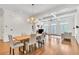 Living room features coffered ceilings, chandelier, fireplace, and lots of natural light at 3676 Brookhaven Manor Ne Xing, Atlanta, GA 30319