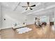 Spacious living room with hardwood floors flowing into the dining and kitchen area, perfect for entertaining at 3676 Brookhaven Manor Ne Xing, Atlanta, GA 30319