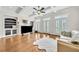 Bright living room with fireplace, coffered ceilings, and lots of natural light at 3676 Brookhaven Manor Ne Xing, Atlanta, GA 30319