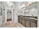The main bathroom features a double vanity, glass shower, and walk-in closet at 3676 Brookhaven Manor Ne Xing, Atlanta, GA 30319