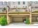 Back of the building with attached garages and private balconies perfect for entertaining at 3676 Brookhaven Manor Ne Xing, Atlanta, GA 30319