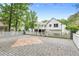Enjoy this fenced in backyard patio with a covered deck, perfect for outdoor entertaining at 4258 Anderson Ridge Way, Austell, GA 30106