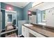 Bright bathroom featuring a vanity with granite countertop, tub and shower at 4258 Anderson Ridge Way, Austell, GA 30106