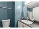 Bathroom featuring a modern vanity, mirror, and a toilet at 4258 Anderson Ridge Way, Austell, GA 30106