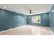 Bedroom with light colored tile floor and ceiling fan at 4258 Anderson Ridge Way, Austell, GA 30106
