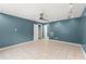 Bedroom with light colored tile flooring and a ceiling fan at 4258 Anderson Ridge Way, Austell, GA 30106