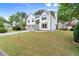 Charming two-story home with a well-manicured lawn, a two-car garage, and a inviting entrance at 4258 Anderson Ridge Way, Austell, GA 30106