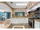 View of kitchen featuring granite countertops, white cabinets, stainless steel appliances at 4258 Anderson Ridge Way, Austell, GA 30106