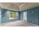 Bright main bedroom featuring trey ceilings, neutral walls, and a ceiling fan at 4258 Anderson Ridge Way, Austell, GA 30106
