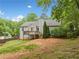 This home features a spacious backyard and a wooden deck, perfect for entertaining at 5525 Tallantworth Trl, Cumming, GA 30040