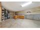 Large basement space with concrete floors, built-in cabinets and a furnace at 5525 Tallantworth Trl, Cumming, GA 30040