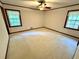 Bedroom that provides ample natural light through its windows and offers a ceiling fan at 880 Havenridge Dr, Conyers, GA 30094