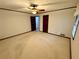Bedroom with ceiling fan and a view to different rooms, creating an open feel at 880 Havenridge Dr, Conyers, GA 30094