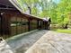 Two-car garage featuring unique glass doors, offering both style and functionality at 880 Havenridge Dr, Conyers, GA 30094