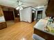 Spacious kitchen with hardwood floors that also offers an open view to a dining and living area at 880 Havenridge Dr, Conyers, GA 30094