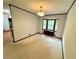 A naturally lit carpeted living room with bay window at 880 Havenridge Dr, Conyers, GA 30094