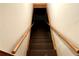 Carpeted staircase leading down to the basement at 880 Havenridge Dr, Conyers, GA 30094