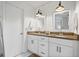 Bathroom features granite double vanity, and sleek modern lighting at 2210 Spear Point Dr, Marietta, GA 30062