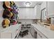 Custom dressing room features unique hat display, vanity and shoe storage at 2210 Spear Point Dr, Marietta, GA 30062