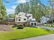 Charming two-story home with a well-manicured front yard, double garage, and inviting curb appeal at 2210 Spear Point Dr, Marietta, GA 30062