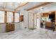 Bright home foyer featuring marble floors and open access to the living room, offering a welcoming space at 2210 Spear Point Dr, Marietta, GA 30062