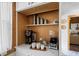 Cozy breakfast bar featuring coffee bar with built-ins, modern appliances, and sleek countertops at 2210 Spear Point Dr, Marietta, GA 30062
