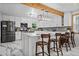 Spacious kitchen with white cabinets, stainless steel appliances, a large island, and stylish pendant lighting at 2210 Spear Point Dr, Marietta, GA 30062