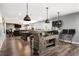 Entertainer's delight with a rustic-style bar and adjacent living area at 365 Freeman Sw Ter, Atlanta, GA 30331