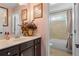 Bathroom featuring a vanity with modern fixtures, and a tub and shower combination at 365 Freeman Sw Ter, Atlanta, GA 30331
