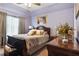 Lovely bedroom featuring a comfortable bed, dresser, and ample natural light at 365 Freeman Sw Ter, Atlanta, GA 30331