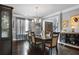 Elegant dining room with hardwood floors, ornate chandelier, and ample seating at 365 Freeman Sw Ter, Atlanta, GA 30331