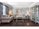 Inviting living room with plush seating, elegant decor, and gleaming hardwood floors at 365 Freeman Sw Ter, Atlanta, GA 30331