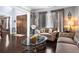 Cozy living room with stylish furnishings, hardwood floors, and natural light at 365 Freeman Sw Ter, Atlanta, GA 30331