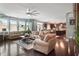 A spacious living room leads to a modern kitchen with dark wood cabinetry and stainless steel appliances at 365 Freeman Sw Ter, Atlanta, GA 30331