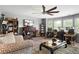 Comfortable living room with modern ceiling fan, home entertainment, and natural light at 365 Freeman Sw Ter, Atlanta, GA 30331