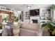 A bright living room features a fireplace, custom built-ins, and decorative plants at 365 Freeman Sw Ter, Atlanta, GA 30331