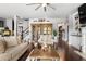 This cozy living room has a decorative fireplace and is brightly lit with natural light from nearby windows at 365 Freeman Sw Ter, Atlanta, GA 30331