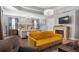 Spacious main bedroom with sitting area, fireplace and large bed at 365 Freeman Sw Ter, Atlanta, GA 30331