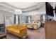 Spacious main bedroom with sitting area, large bed and tray ceiling at 365 Freeman Sw Ter, Atlanta, GA 30331