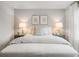 Comfortable bedroom with neutral tones, decorative bedside lamps, and natural light at 5641 Hislop Ln # 88, Mableton, GA 30126