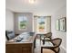 A modern office with natural light and a stylish desk and chair at 5641 Hislop Ln # 88, Mableton, GA 30126