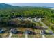 New construction neighborhood featuring two-story homes with manicured lawns and tree-lined streets at 61 N Village Cir, Rydal, GA 30171