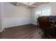 Bright office space with paneled walls, a modern ceiling, and large window, perfect for remote work at 61 N Village Cir, Rydal, GA 30171