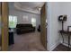 Relaxing main bedroom featuring a ceiling fan and two windows at 61 N Village Cir, Rydal, GA 30171
