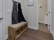 Functional mud room area with bench storage and convenient coat rack at 61 N Village Cir, Rydal, GA 30171