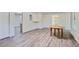 Spacious basement with modern gray vinyl plank floors, open layout and lots of light at 680 Ruxbury Ct, Suwanee, GA 30024