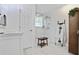 Modern bathroom features a glass-enclosed shower, vanity with integrated sink, and stylish decor at 680 Ruxbury Ct, Suwanee, GA 30024