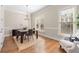 Dining room area with hardwood floors and lots of natural light at 1954 Saxon Valley Ne Cir, Brookhaven, GA 30319