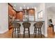 Kitchen bar with barstool seating and stainless steel appliances at 1954 Saxon Valley Ne Cir, Brookhaven, GA 30319